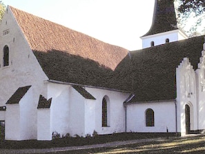 A white building with a red roof and a bell tower. - 5 Person Holiday Home in Hovborg (Hovborg)