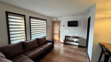 Apartment, 2 Bedrooms | Living area | Smart TV