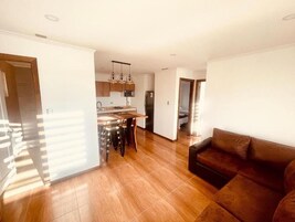 Apartment, 2 Bedrooms | Living area | Smart TV