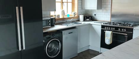 Refrigerador, microondas, horno, placa de cocina