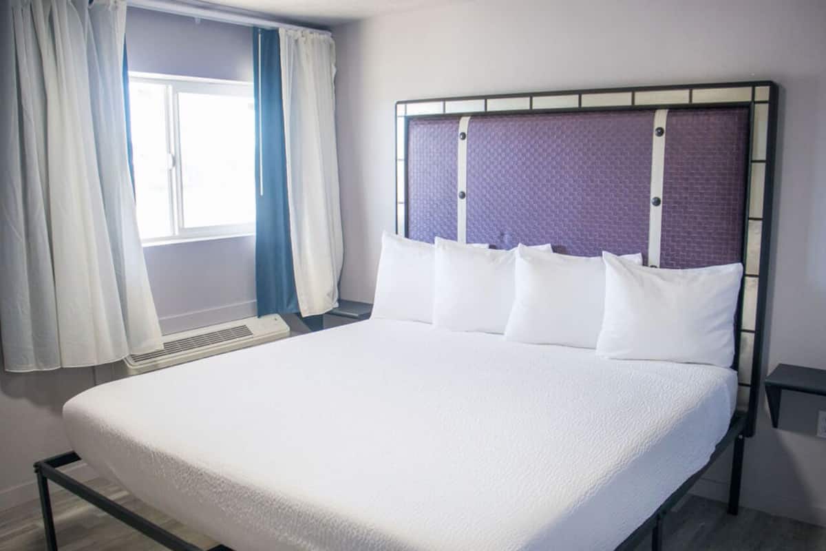 Suite Deluxe, 2 chambres | Couette en duvet d'oie, bureau