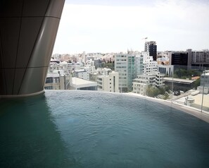 A view of a cityscape with modern buildings and a body of water. - Saffron Suite | Retreat with Skyline Views & Pool (Nicosia)