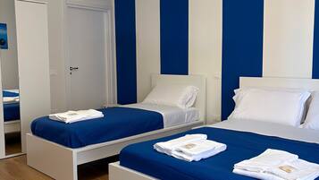 Premium bedding, memory-foam beds, individually furnished, desk