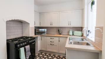 Fridge, electric kettle, toaster, cookware/dishes/utensils