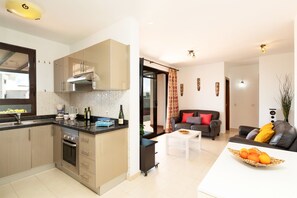 Een magnetron, een vaatwasser, een koffiezetapparaat/waterkoker