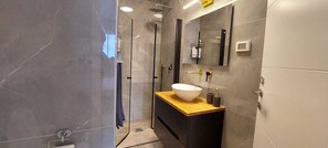 Hair dryer, towels, soap, shampoo