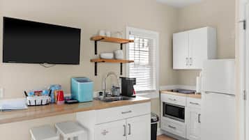 Fridge, microwave, coffee/tea maker, toaster