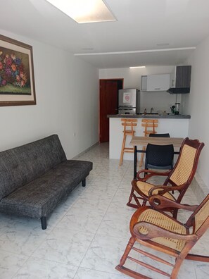 Fer et planche à repasser, draps fournis