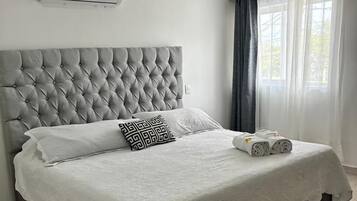 Deluxe Double Room | Iron/ironing board, bed sheets, wheelchair access