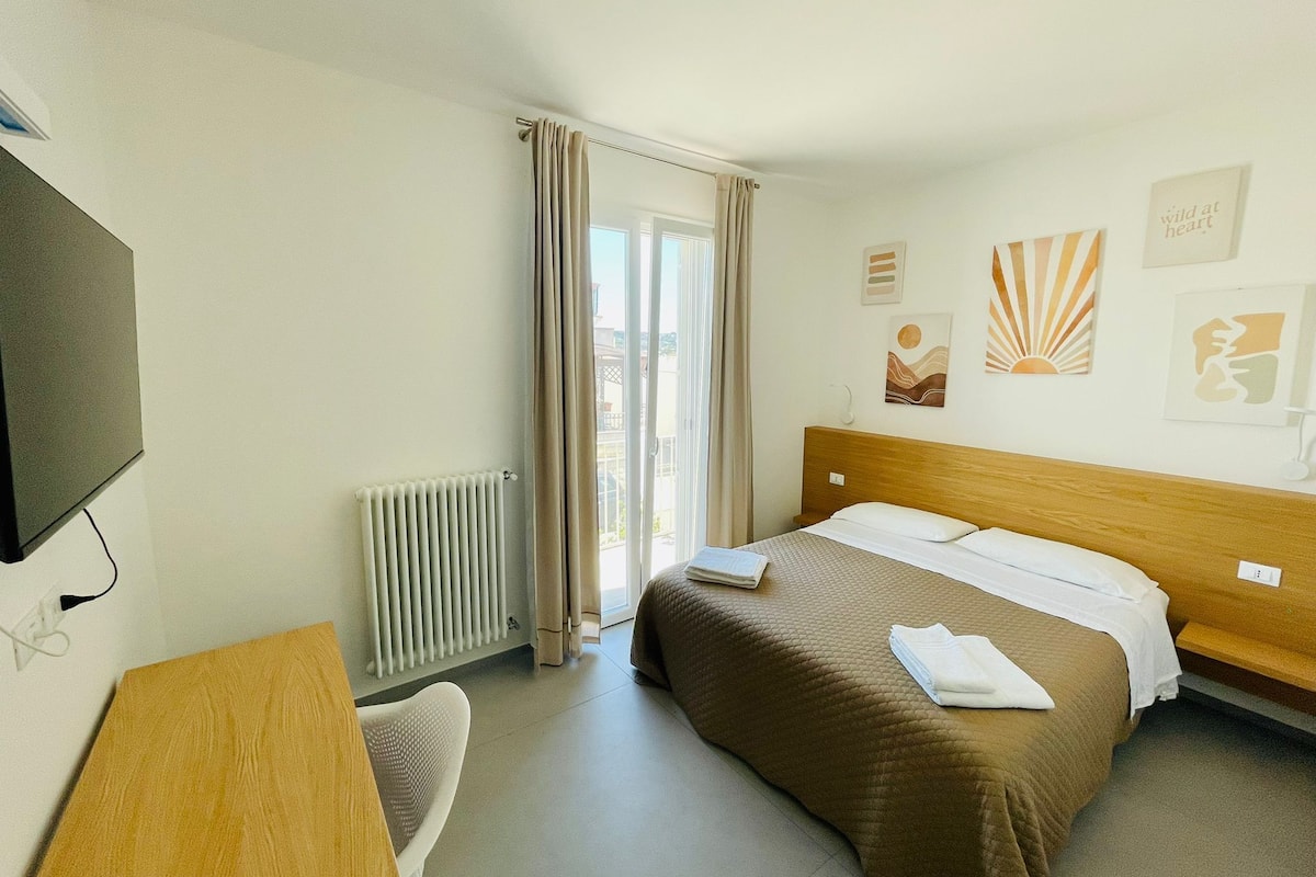 Desk, laptop workspace, free WiFi, bed sheets