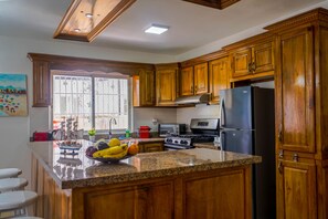 Villa, Multiple Beds | Private kitchen | Fridge, microwave, oven, stovetop