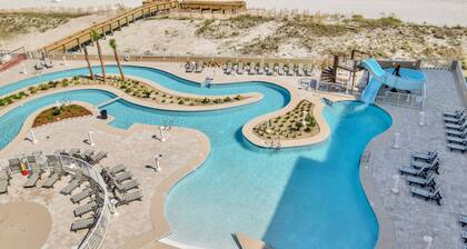 Direct Premium Beachfront Walk to restaurants Lazy River-Waterslide-Splash pad