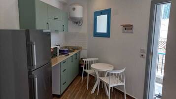 Superior Apartment | Private kitchen | Fridge, freezer