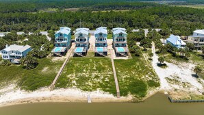 A coastal property with multiple beachfront villas, each featuring a pool and direct beach access. - Silver Strand: Large 7 BR Beachfront Home- Sleeps 24, Pet Friendly, Priv. Pool (Indian Pass)