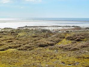 Guests can enjoy a serene beach experience with access to the coast.