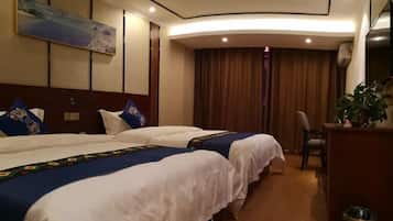 A hotel room with two beds, a painting on the wall, a curtain, a chair, and a trash bin.