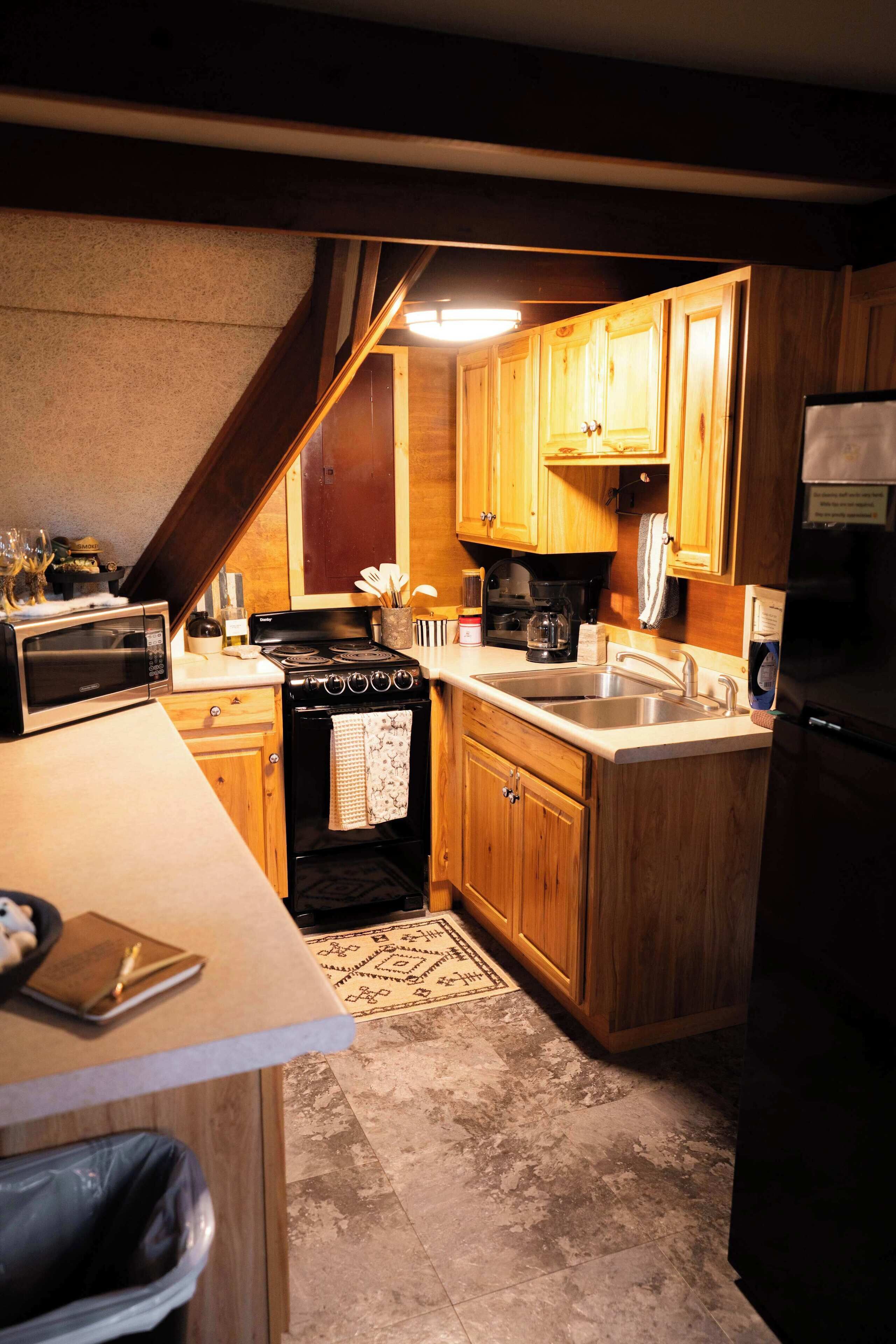 Fridge, microwave, stovetop, coffee/tea maker