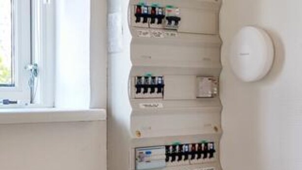 A wall-mounted electrical panel with multiple circuit breakers. - 4 Star Holiday Home in Borre (Borre)