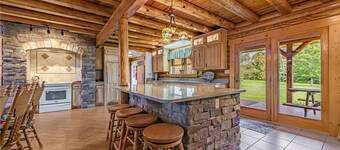 Luxury Cabin 22min to 7 Springs w/ Hot Tub, Sauna, Game Room & Views on 32 Acres