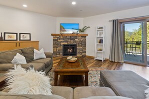 Smart TV, fireplace, foosball, books