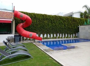Outdoor pool, a heated pool - Lively villa with pool, waterfall, and slide (Tulum)