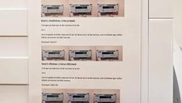 A series of air conditioning units mounted on a wall.
