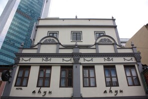 A building with a sign reading 'ahyu' and 'HOTEL' indicating it is a hotel. - Ahyu Hotel (Kuala Lumpur)