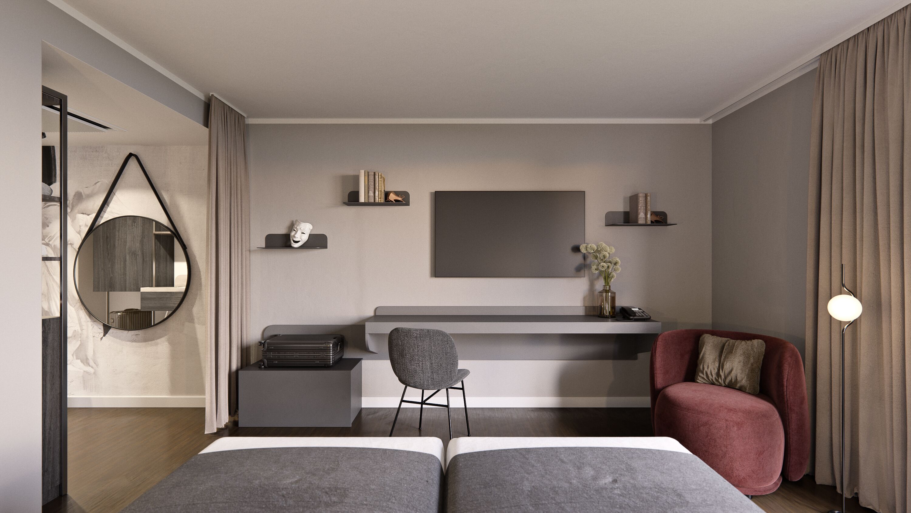 A modern bedroom with a bed, a desk, a chair, and a large mirror.