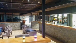 A bar area with seating and a counter. - 6 Person Holiday Home in Svelgen-by Traum (Bremanger)