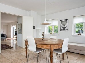 Enjoy meals in this well-appointed dining area with a round table and four chairs.