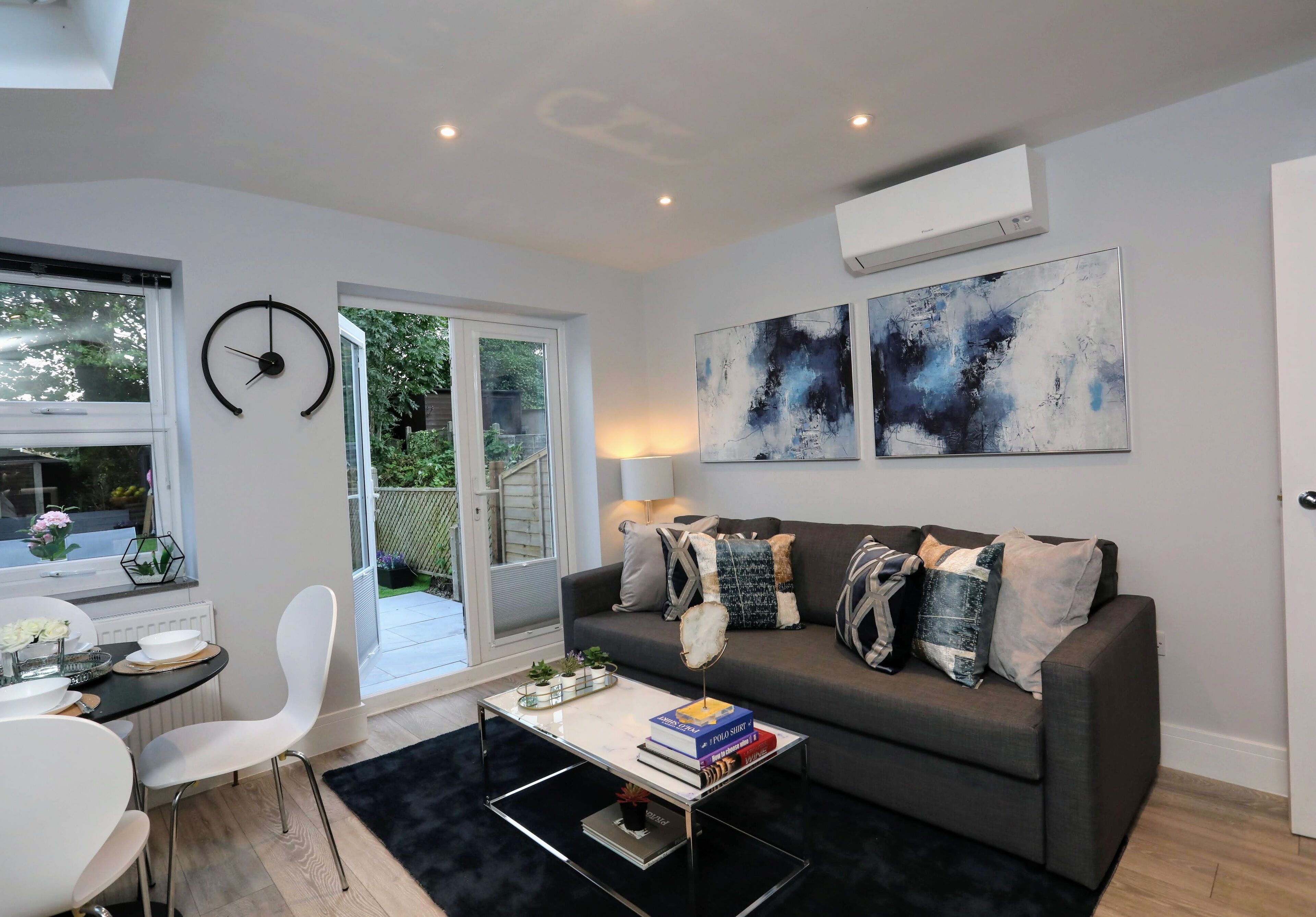 Family Apartment | Living area | 55-inch Smart TV with satellite channels, TV