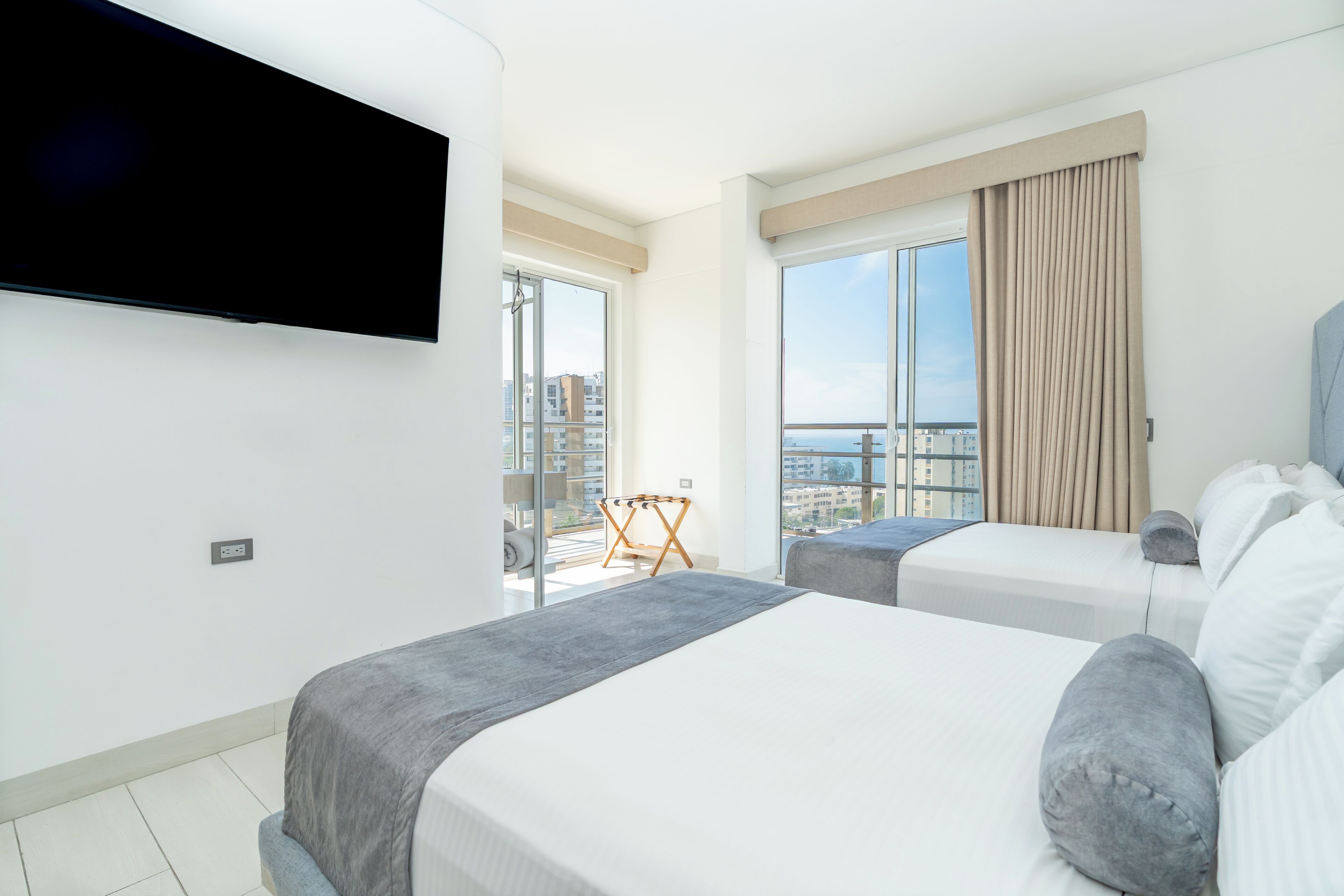 Quarto família | Vista para a cidade