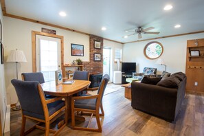 TV, fireplace, books