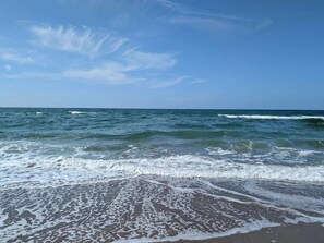 A beach with waves, clear sky, and no visible structures. - 4 Person Holiday Home in Helsinge (Helsinge)