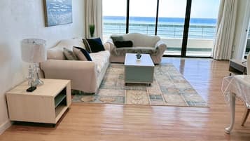 Premium Condo, 3 Bedrooms, Non Smoking, Beach View | Living area | 55-inch Smart TV with cable channels, TV