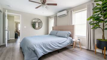 1 bedroom, desk, iron/ironing board, travel crib