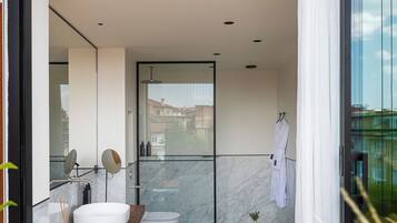 Rainfall showerhead, designer toiletries, hair dryer, bathrobes