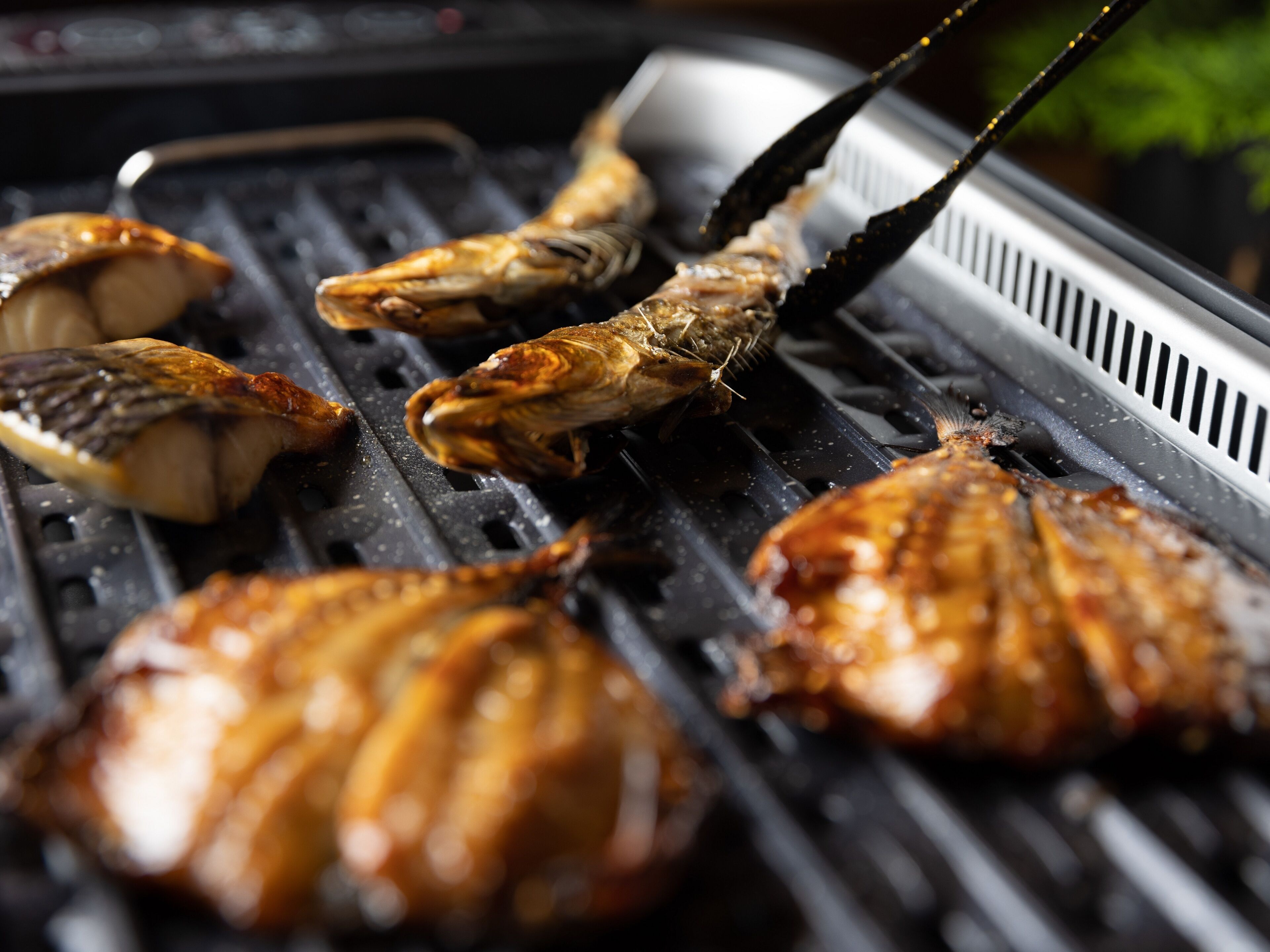 Grilled seafood on a grill.