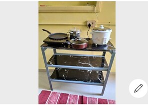 Fridge, stovetop, cookware/dishes/utensils, dining tables