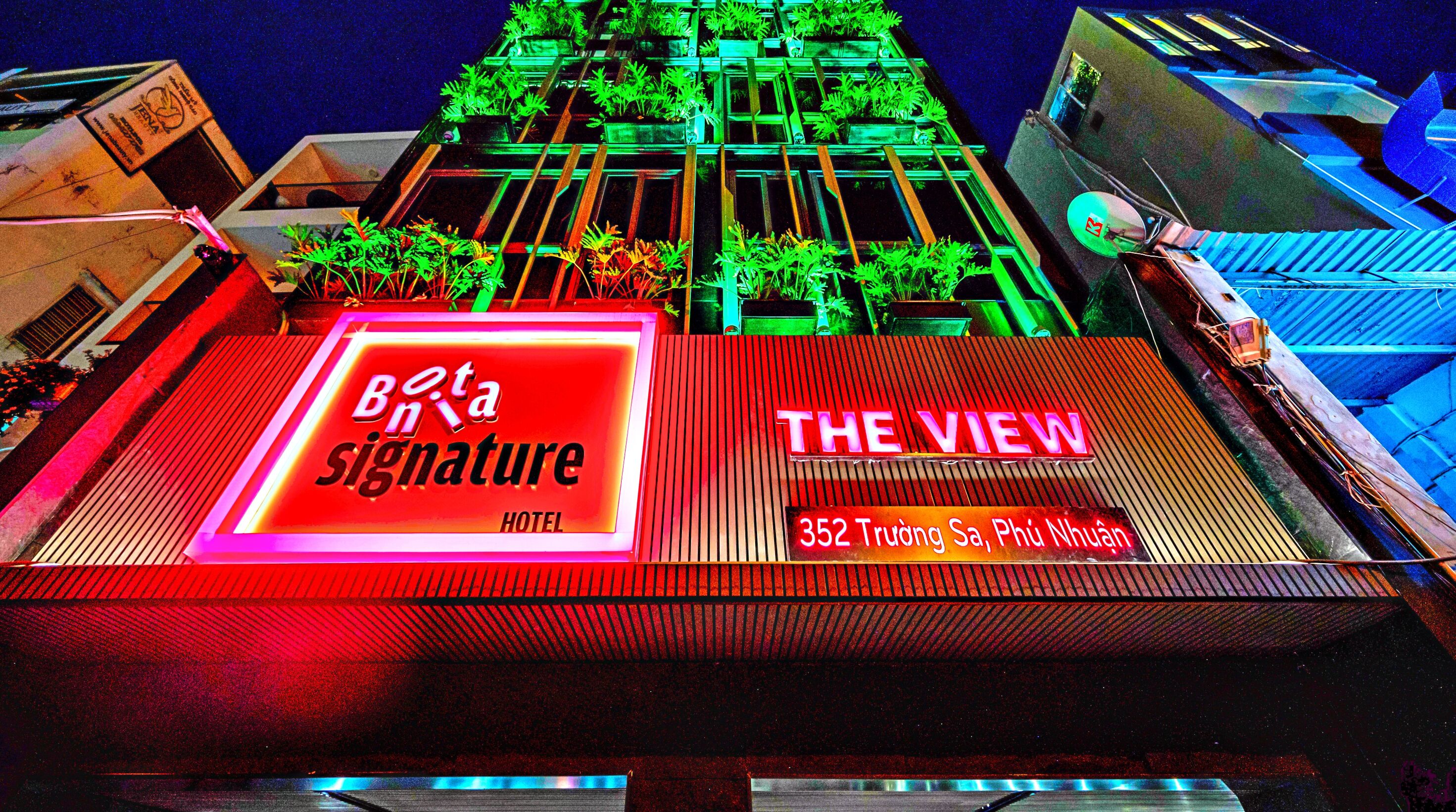A hotel sign with 'Beta Signature' and 'The View' indicating a view from the hotel.