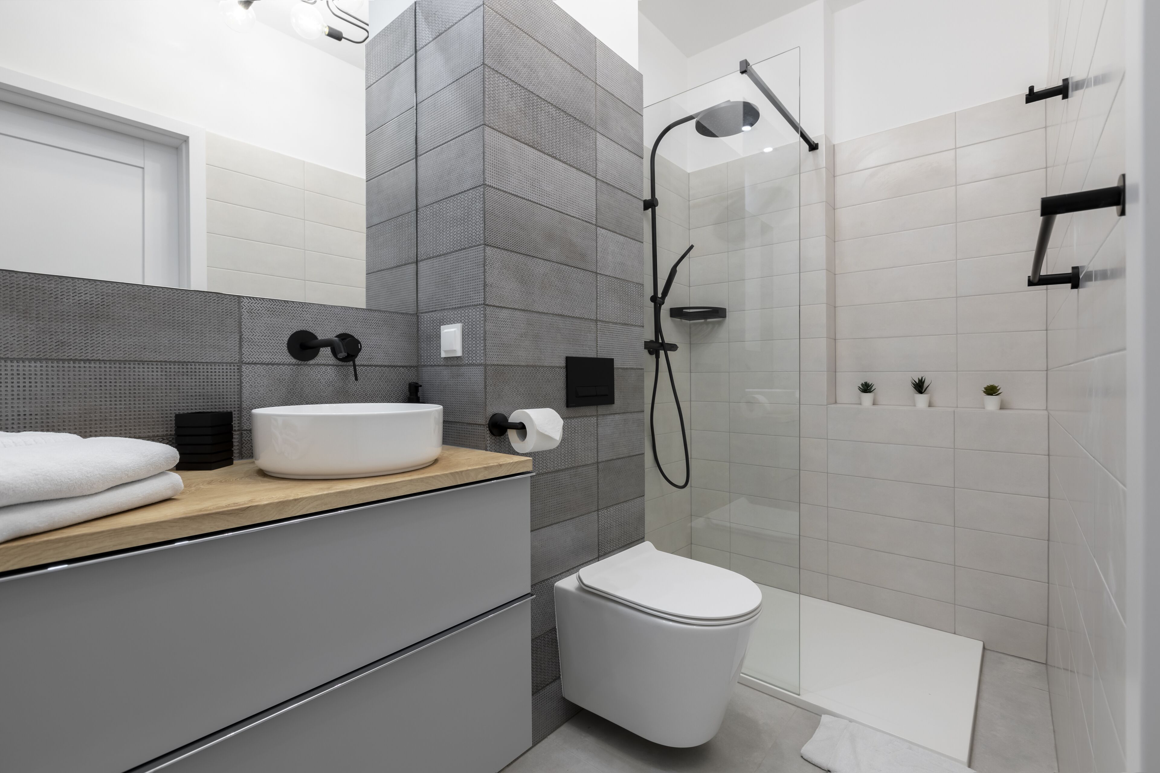 Standaard studio suite | Badkamer | Gratis toiletartikelen, een haardroger, handdoeken, toiletpapier