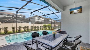 Outdoor dining - Rent This Luxury 5 Star House on Windsor at Westside Resort, Orlando House 6151 (Kissimmee)