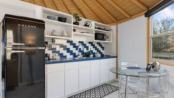 Fridge, microwave, coffee/tea maker, toaster