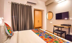 Egyptian cotton sheets, premium bedding, in-room safe, desk - Fabhotel Heera Holiday Inn (Kolkata)