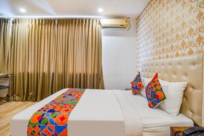 Lakens van Egyptisch katoen, luxe beddengoed, een kluis op de kamer