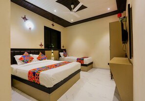 Premium kamer | Lakens van Egyptisch katoen, luxe beddengoed, een kluis op de kamer