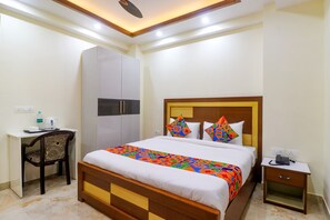 Egyptian cotton sheets, premium bedding, in-room safe, desk - Fabhotel Star Corporate Suite (Gurugram)
