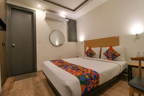 Deluxe Room | Egyptian cotton sheets, premium bedding, in-room safe, desk - Fabhotel The Chaitanyas (New Delhi)