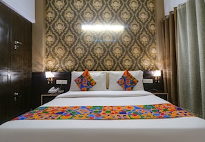 Chambre Prestige | Draps en coton égyptien, literie de qualité, coffre-fort, bureau