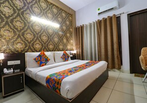 尊榮客房 | 埃及棉床單、高級寢具、客房內保險箱、書桌